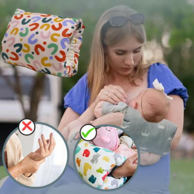 Une maman utilise un coussin allaitement bariolé pour allaiter confortablement son bébé