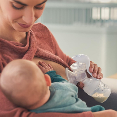 tire lait manuel milka bébé au sein