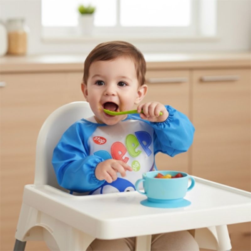 Bavoir bebe Douceur Absorbante enfant mange avec sa cuillere