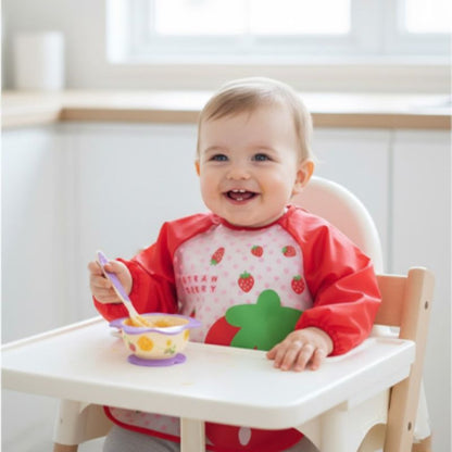 Bavoir bebe Douceur absorbante enfant souriant et mange