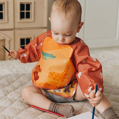 Bavoir bebe Petit Ange enfant assis sur tapis