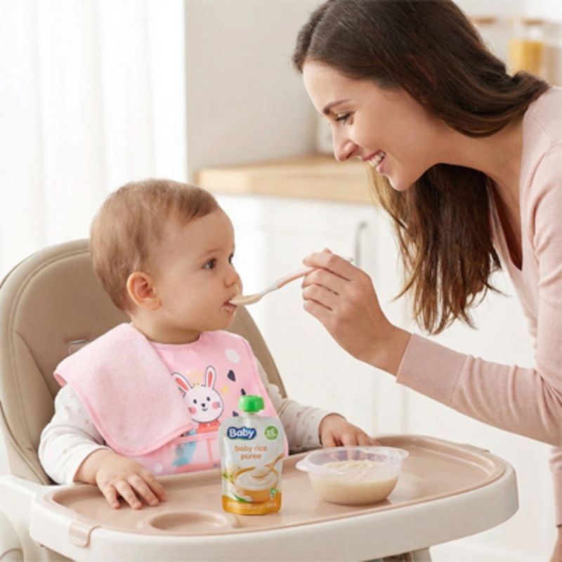Bavoir pour bébé, protection maman, donne cuillère a son petit