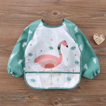 Bavoir Bebe Petit Ange sur la table bois