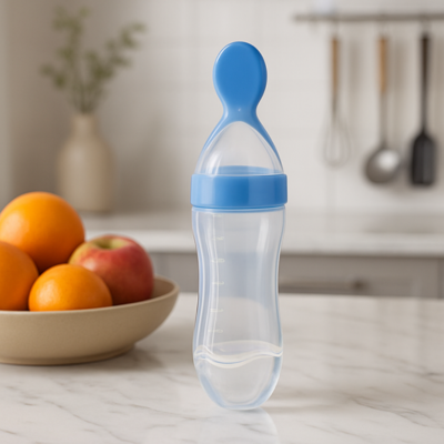biberon cuillere bleu poser sur table