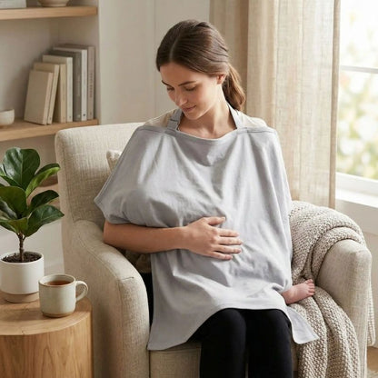 Cape allaitement maman couvre son bebe dans ses bras