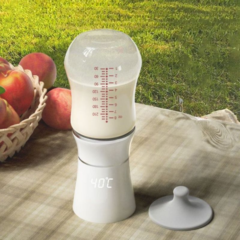 Chauffe biberon Nomade sur herbe