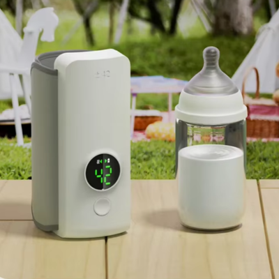 Chauffe biberon nomade sur table jardin
