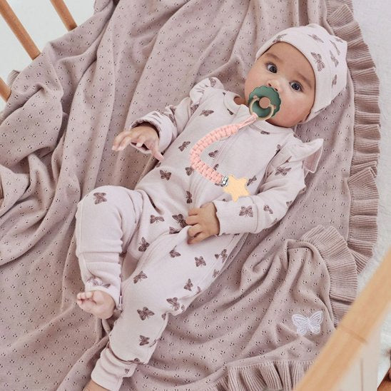 Attache tetine accroche a son pyjama