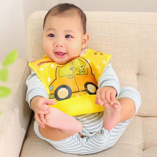 bavoir bebe ajustable et lavable taxi jaune