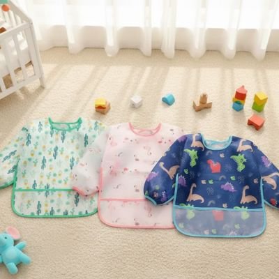 Bavoir manche longue trois motifs varie