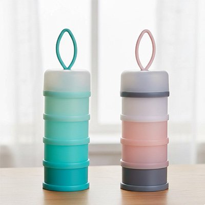 Boite doseuse lait nomade poser sur table