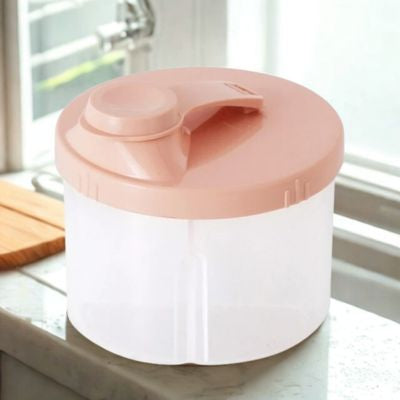 boite doseuse lait rose en cuisine