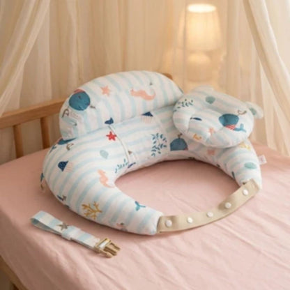 coussin d'allaitement pose sur le lit