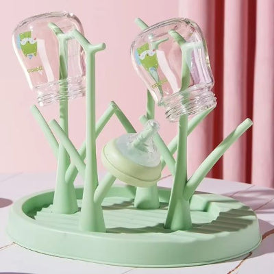 egouttoir biberon ecodry devant un rideau