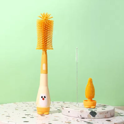 goupillon biberon jaune sur presentoire