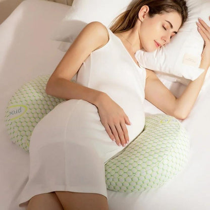 maman allonger sereine avec son coussin grossesse 