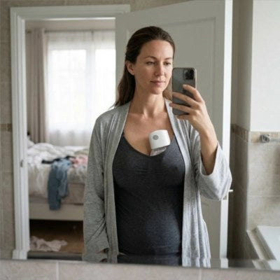 maman prend en photo son Tire lait electrique