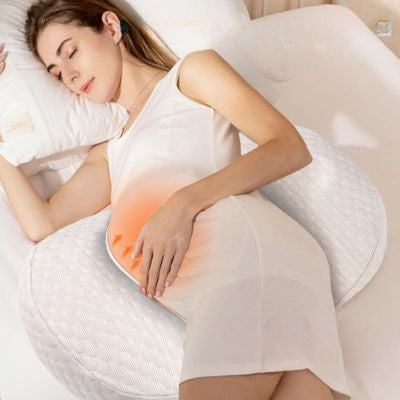 maman allonger sur son coussin grossesse