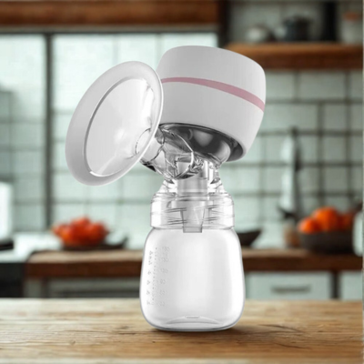 tire lait electrique bicolore blanc sur table