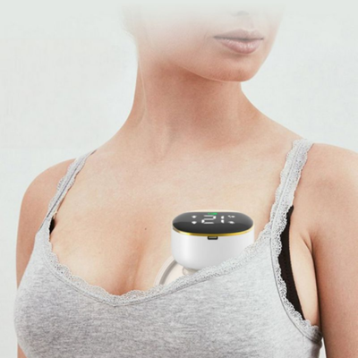 tire lait electrique dans vetement maman